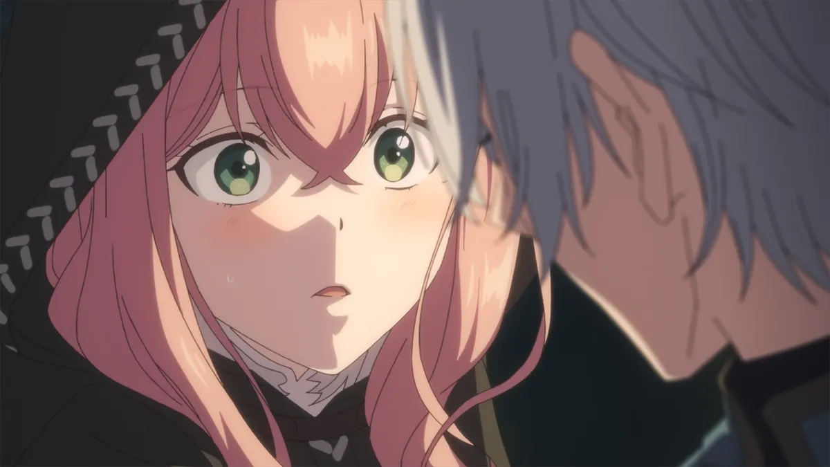 A girl with pink hair and green eyes under a black hood blushes and stares wide-eyed at a silver-haired man whose face is close to hers in the foreground, in a still from Hello, I Am a Witch and My Crush Wants Me to Make a Love Potion! episode 2