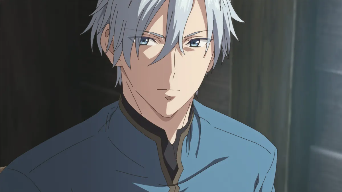 A man with silver hair and pale blue eyes in a blue high-collared uniform looks straight ahead with a calm, serious expression, in a still from Hello, I Am a Witch and My Crush Wants Me to Make a Love Potion! episode 2